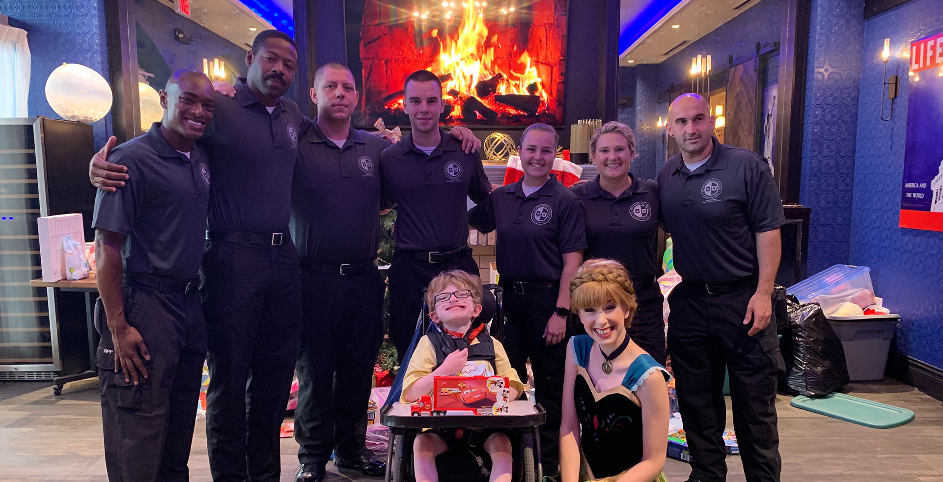 Officers with special needs child and disney character