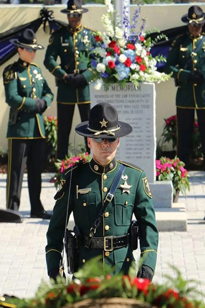 Officers standing vigil at memorial for fallen heros