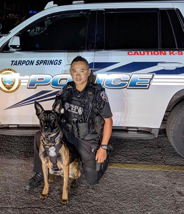 Tarpon Springs officer with K9 dog